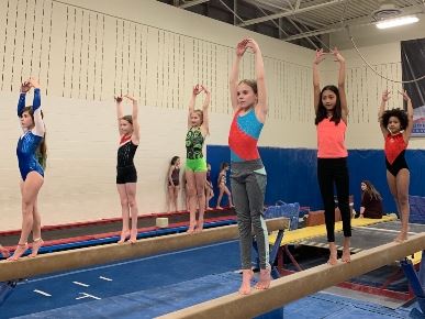 girls on beam 